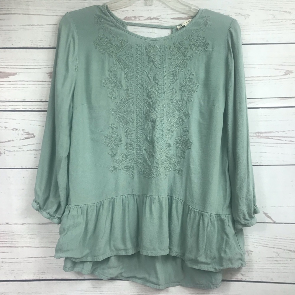 Teal boho top with cute embroidery design
